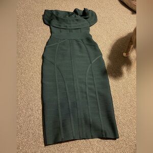 Green strapless bandage dress.